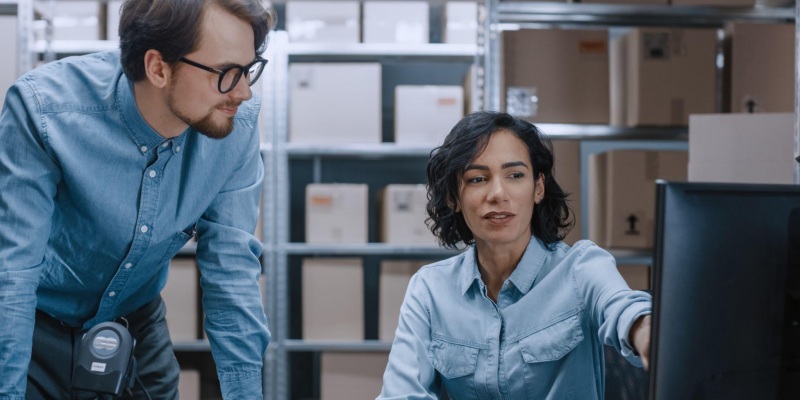 coworkers discussing their EDI services