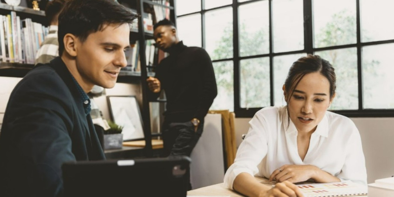 two colleagues working together