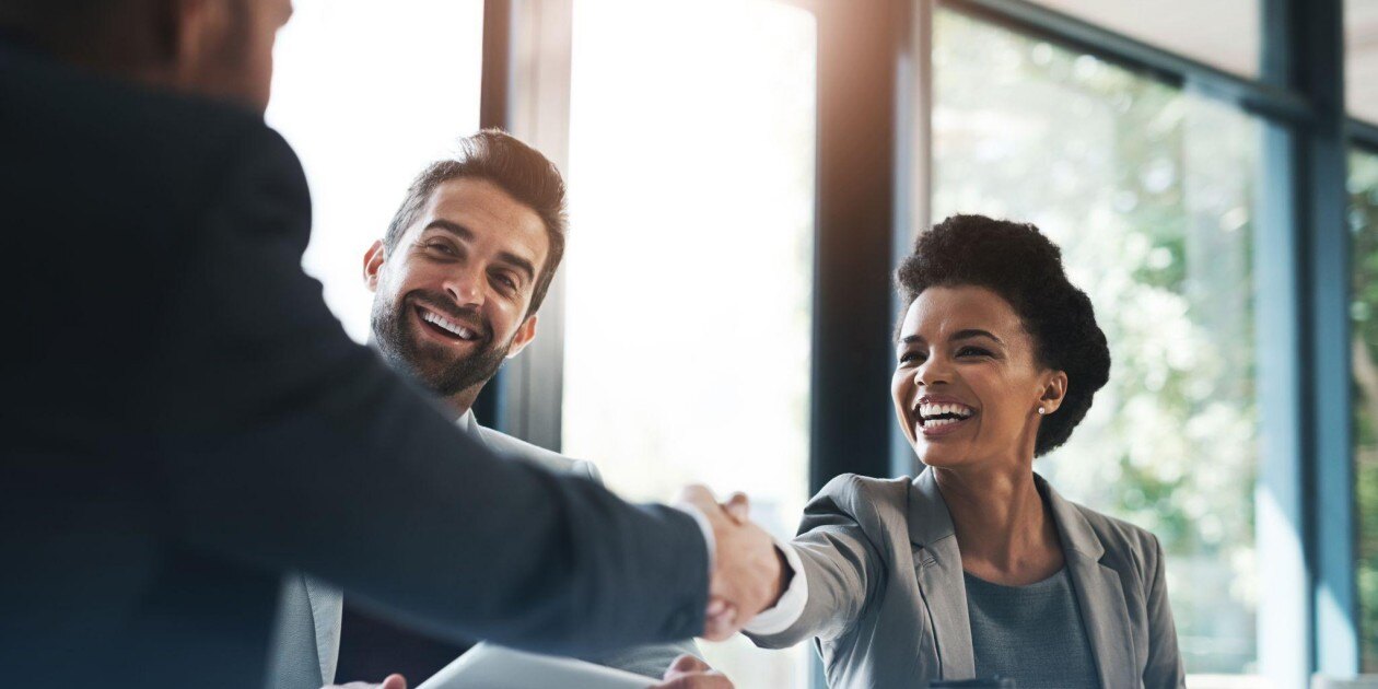 Employer shaking hands with a potential employee.