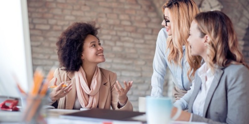 Three women having a discussion