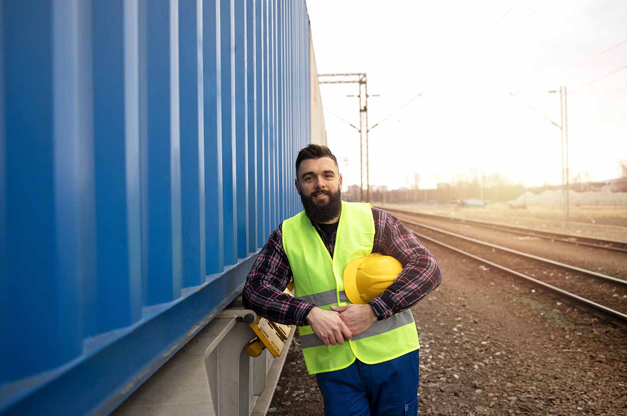 A picture of a commercial truck who is happy and relaxed due to the Cleo training delivered by Remedi that allowed his company to give him real time information that allowed him to deliver his intermodal container on time.